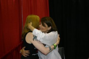 Hugging Linda Hamilton