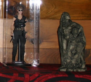 Sarah Connor action figure and Dryad Design Morrigan statue
