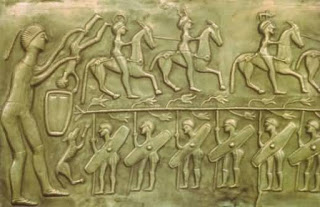 Panel from Gundestrup Cauldron, likely showing a warrior initiation
